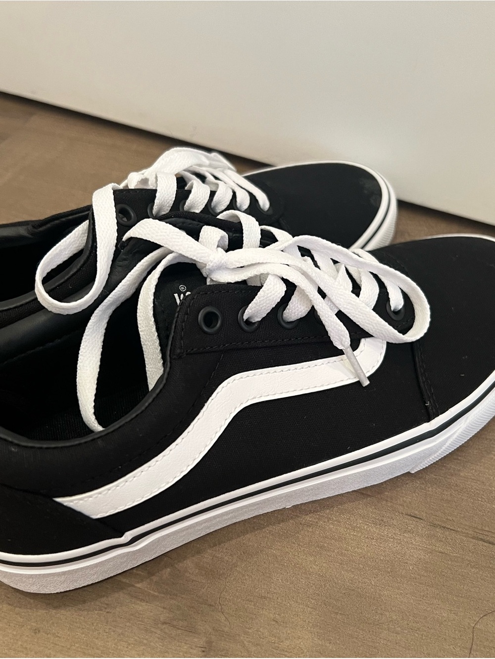 Vans Black and White Ward Low Top Sneakers
